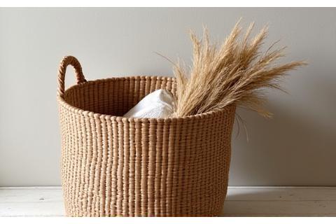 Handwoven natural fiber storage basket